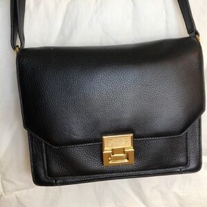 Beautiful black leather and gold shoulder bag